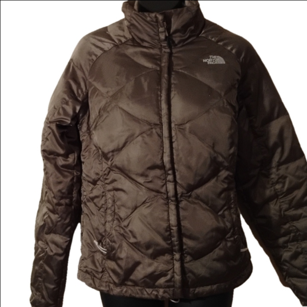 The North Face quilted thicker puffer coat. Pretty grey .Size small . Super warm